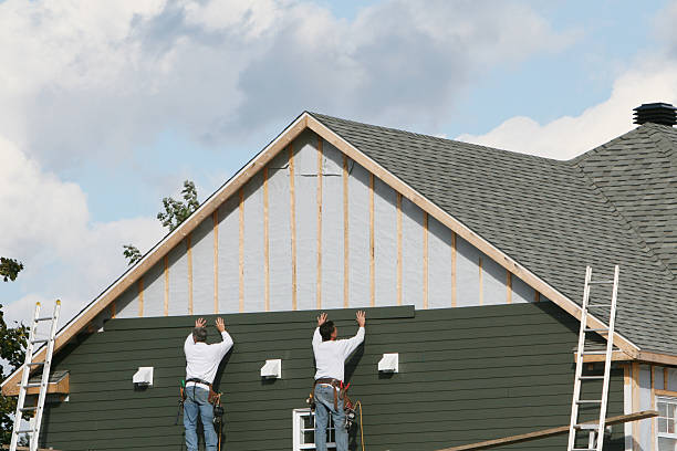 Professional Storm Damage Siding Repair technician working in Brandamore, PA